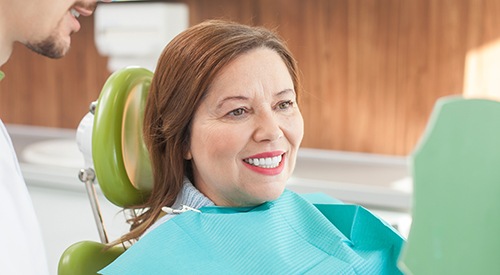 Woman smiling in the dental chair