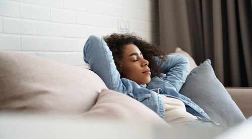 Patient relaxing on couch at home